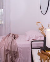 Pink Blush Bamboo Sheets with luxury throw rug
